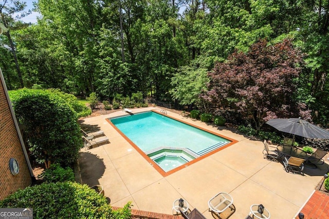 1681 Wild Azalea Ln, Athens, GA 30606 - swimming pool with an in-ground hot tub and a patio