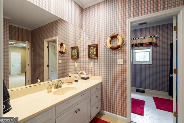 1681 Wild Azalea Ln, Athens, GA 30606 - bathroom with crown molding, vanity, tile patterned floors, and baseboards