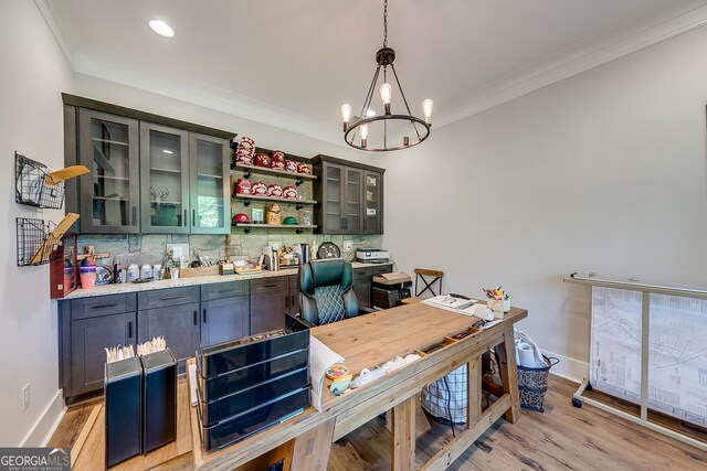 home office with ornamental molding, a chandelier, light wood-style flooring, baseboards, and recessed lighting