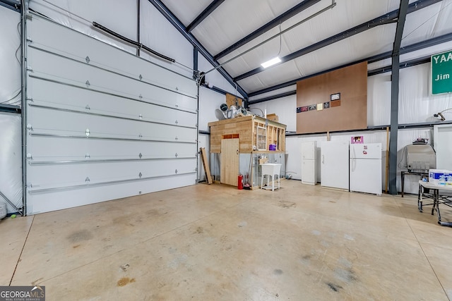 garage featuring freestanding refrigerator