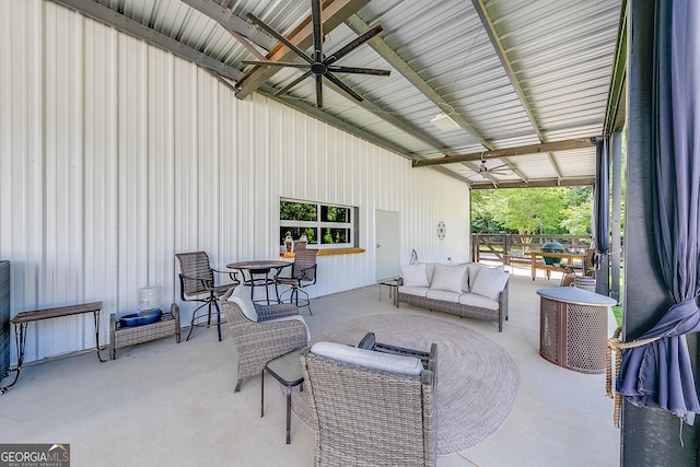 view of patio featuring ceiling fan and an outdoor living space