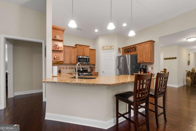 kitchen featuring appliances with stainless steel finishes, open shelves, a peninsula, tasteful backsplash, and light stone counters