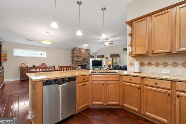 kitchen with stainless steel dishwasher, dark wood-type flooring, ceiling fan, a peninsula, and vaulted ceiling