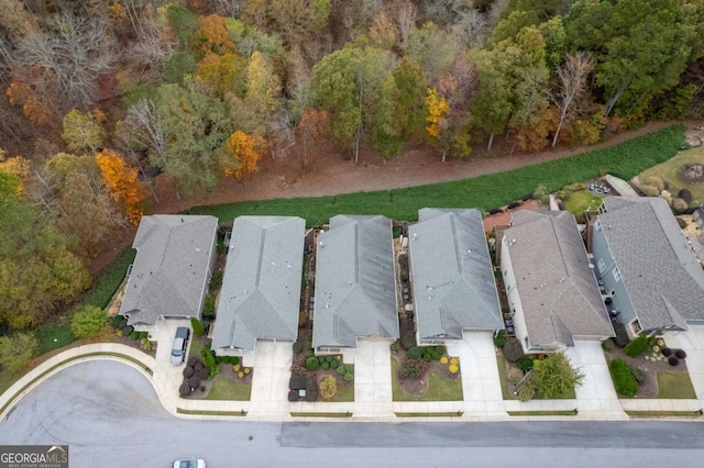 aerial view of property's location with nearby suburban area