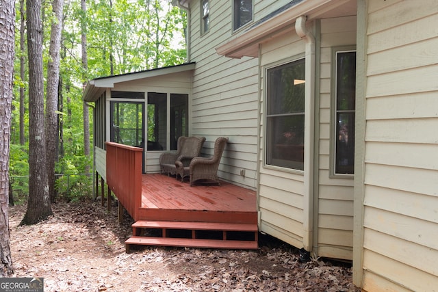 wooden terrace with a sunroom