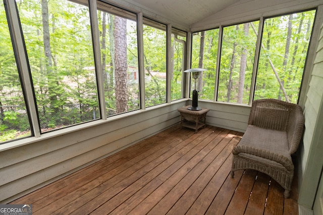 sunroom with lofted ceiling