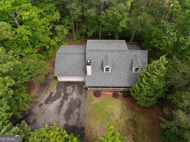 view from above of property featuring a forest