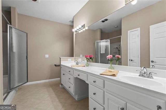 226 Hames Rd Unit 335, Woodstock, GA 30188 - full bathroom featuring double vanity, a stall shower, and tile patterned floors