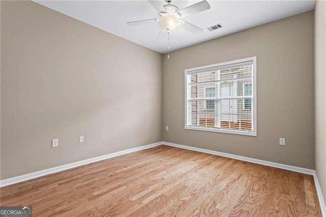 226 Hames Rd Unit 335, Woodstock, GA 30188 - unfurnished room with light wood-type flooring and a ceiling fan
