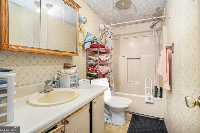 2249 Jackson Lake Rd, Mansfield, GA 30055 - full bath featuring wallpapered walls,  shower combination, tile patterned floors, toilet, and vanity