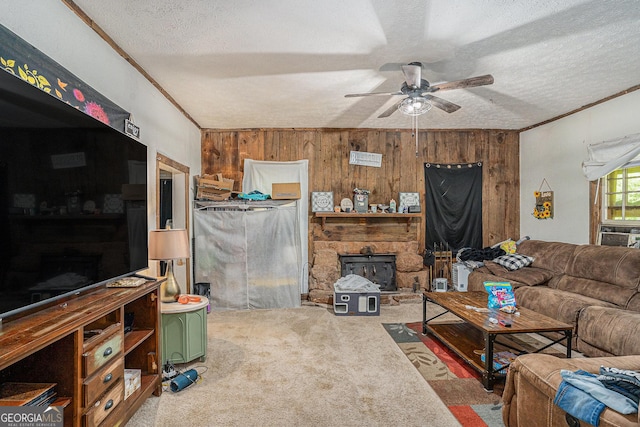 2249 Jackson Lake Rd, Mansfield, GA 30055 - living room featuring carpet, ceiling fan, a textured ceiling, crown molding, and wooden walls