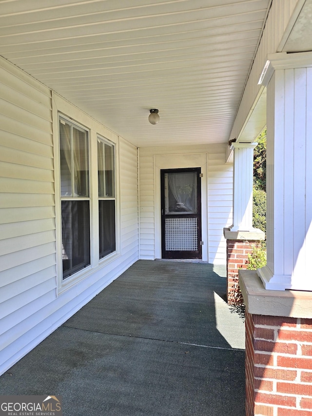 61 Calhoun St, Gibson, GA 30810 - view of patio with a porch