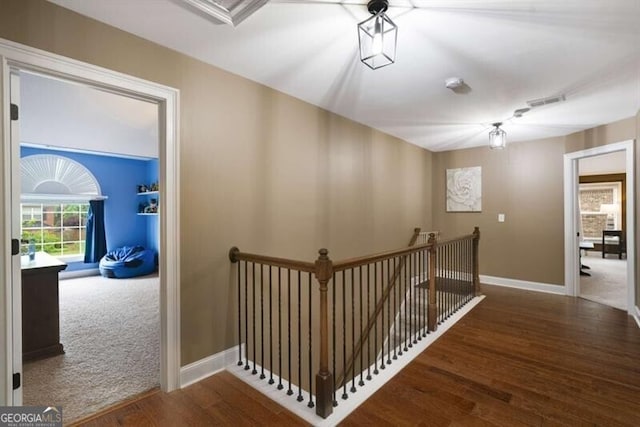 4415 Saint Andrews Crest Dr, Cumming, GA 30040 - corridor with an upstairs landing and wood finished floors