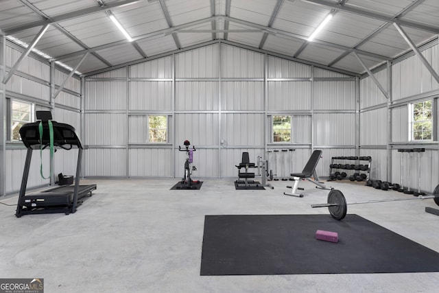 gym with a garage and metal wall