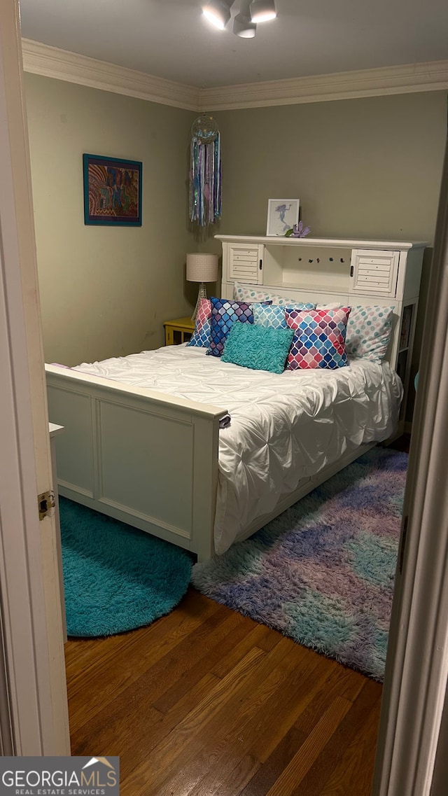 220 N Springs Ct, Sandy Springs, GA 30328 - bedroom with wood finished floors and ornamental molding
