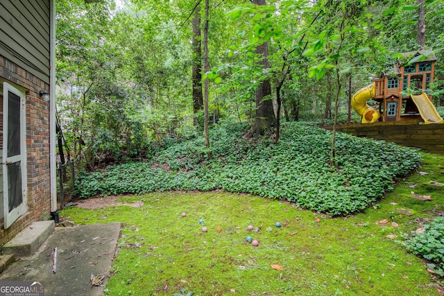 220 N Springs Ct, Sandy Springs, GA 30328 - view of grassy yard with a playground