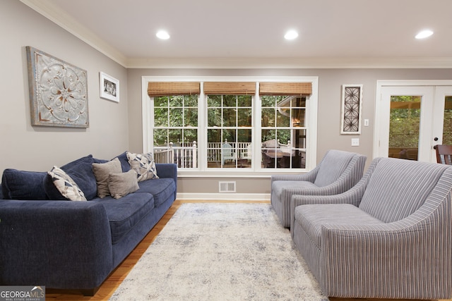 220 N Springs Ct, Sandy Springs, GA 30328 - living area featuring ornamental molding, wood finished floors, french doors, and recessed lighting