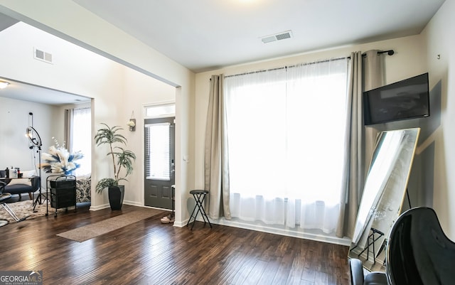 2496 Osceola Rd, Lithonia, GA 30058 - foyer featuring wood-type flooring and baseboards