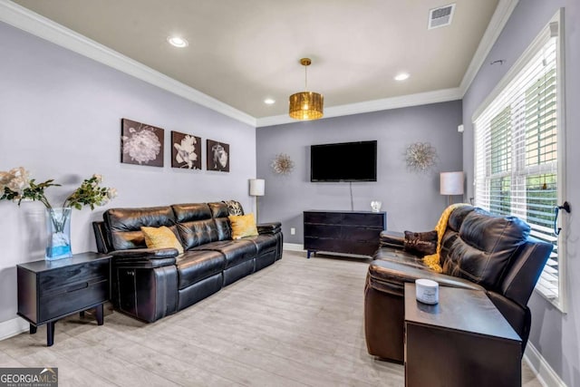 2102 Braswell Ln, Loganville, GA 30052 - living area featuring baseboards, recessed lighting, ornamental molding, and light wood-type flooring