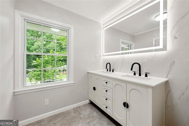 2828 Cloverhurst, Atlanta, GA 30344 - bathroom with plenty of natural light, crown molding, double vanity, and baseboards