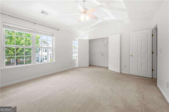 1135 Kilmington Ct, Alpharetta, GA 30009 - unfurnished bedroom featuring light colored carpet, vaulted ceiling, baseboards, a closet, and a ceiling fan