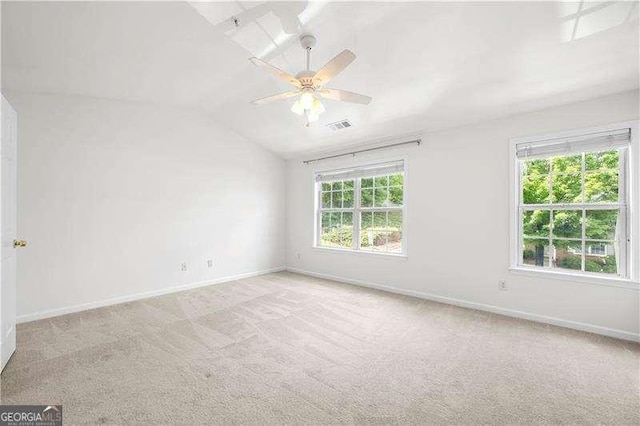 1135 Kilmington Ct, Alpharetta, GA 30009 - empty room featuring light carpet, lofted ceiling, baseboards, and a ceiling fan