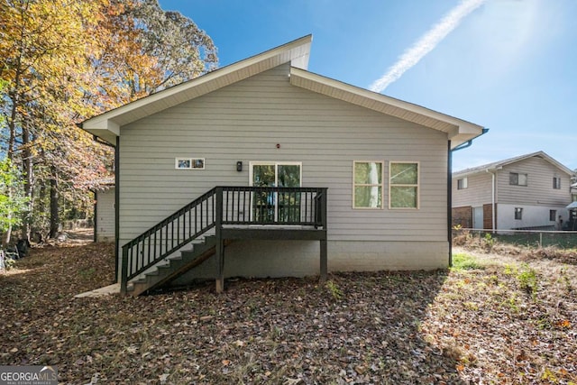 7428 Mockingbird Trl, Riverdale, GA 30274 - back of property featuring fence and stairway