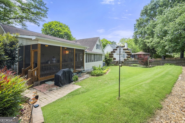 503 Bonnie Dr, Woodstock, GA 30188 - view of yard with a sunroom and a patio