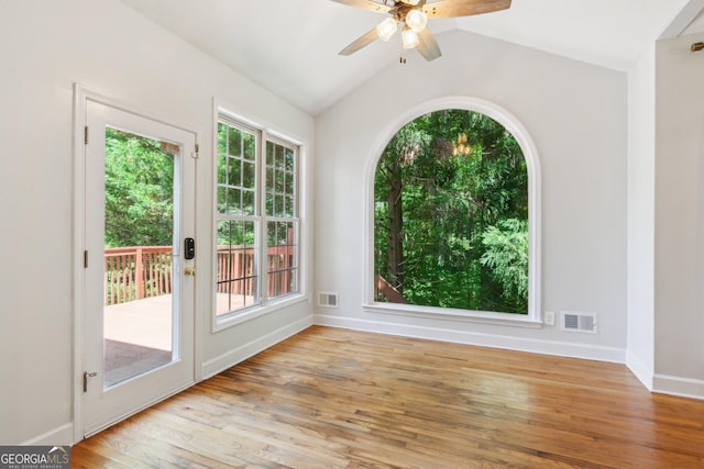 610 Golden Meadows Ln, Suwanee, GA 30024 - doorway to outside with plenty of natural light, wood finished floors, a ceiling fan, baseboards, and lofted ceiling