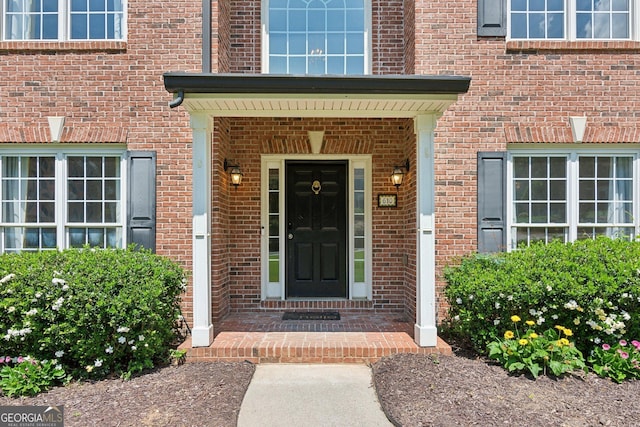 610 Golden Meadows Ln, Suwanee, GA 30024 - property entrance featuring brick siding