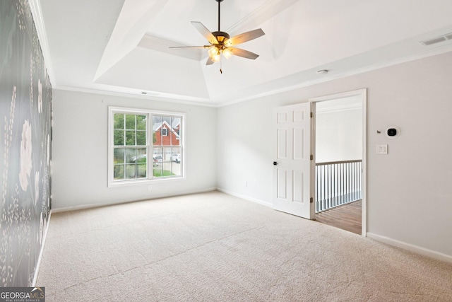 610 Golden Meadows Ln, Suwanee, GA 30024 - spare room featuring carpet flooring, a ceiling fan, baseboards, and a tray ceiling