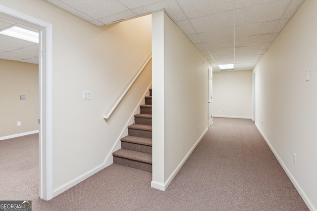 610 Golden Meadows Ln, Suwanee, GA 30024 - hall with carpet flooring, a paneled ceiling, stairs, and baseboards