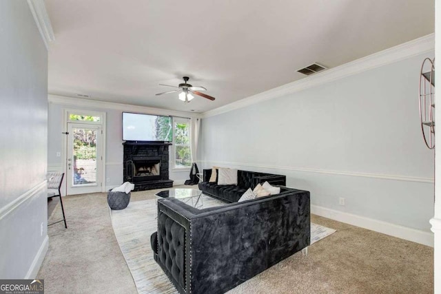 7933 Heathmore Dr, Fairburn, GA 30213 - carpeted living area with ceiling fan, crown molding, and a fireplace