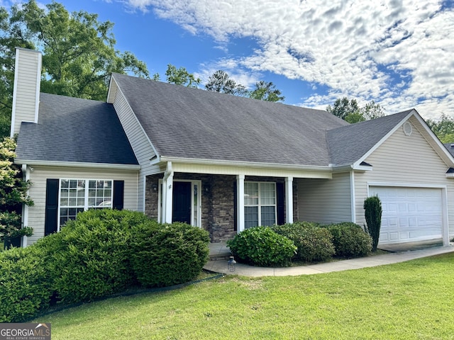 510 Sugarloaf Dr, Macon, GA 31204 - view of front of home featuring a garage, a front yard, a chimney, and a shingled roof