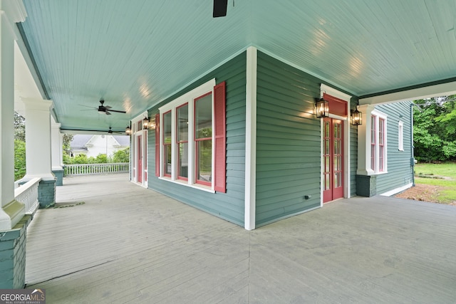409 N Jefferson Ave, Eatonton, GA 31024 - wooden deck with a porch and ceiling fan