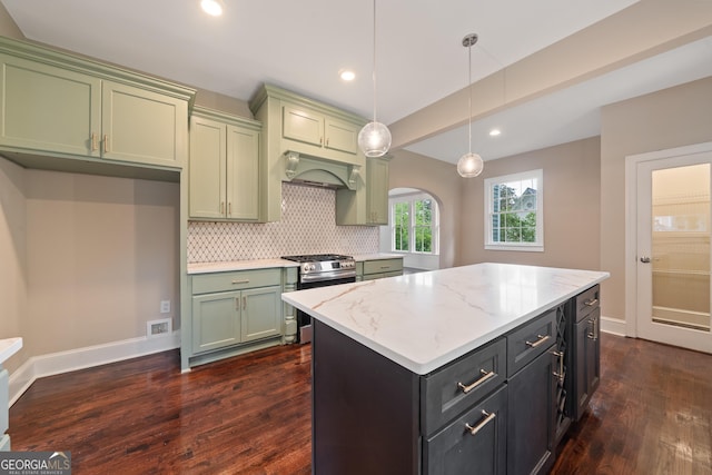 409 N Jefferson Ave, Eatonton, GA 31024 - kitchen with stainless steel range with gas cooktop, green cabinetry, dark wood-type flooring, decorative backsplash, and recessed lighting