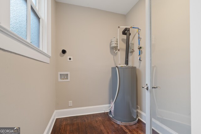 409 N Jefferson Ave, Eatonton, GA 31024 - utility room with water heater