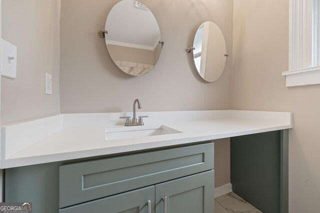 409 N Jefferson Ave, Eatonton, GA 31024 - bathroom featuring vanity and marble look tile flooring