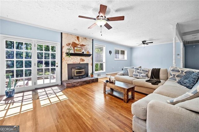 1759 Kimberly Dr, Marietta, GA 30008 - living area with a ceiling fan, a textured ceiling, wood finished floors, and ornamental molding