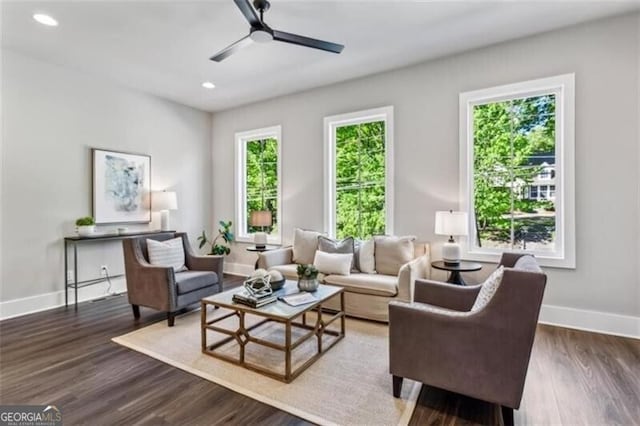 sitting room featuring baseboards, recessed lighting, ceiling fan, and wood finished floors