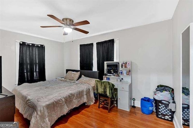 104 Dellwood Dr NW, Rome, GA 30165 - bedroom with wood finished floors and ceiling fan