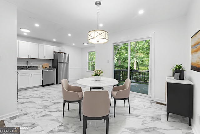 118 Greentree Pkwy, Macon, GA 31220 - dining space with light marble finish floors and recessed lighting