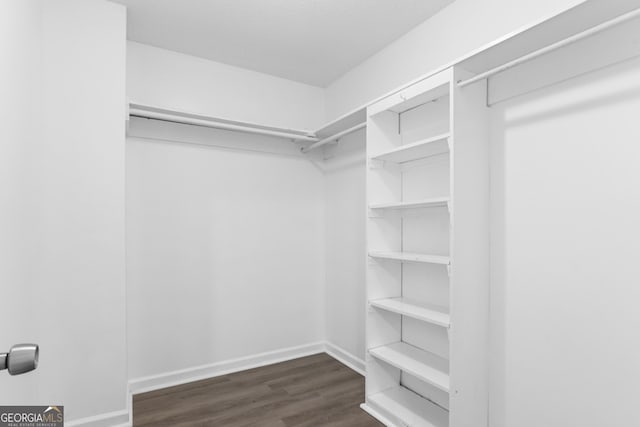 118 Greentree Pkwy, Macon, GA 31220 - walk in closet with dark wood finished floors