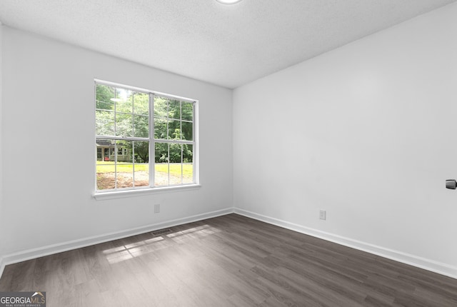 118 Greentree Pkwy, Macon, GA 31220 - empty room featuring dark wood-style floors and a textured ceiling