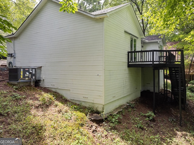 118 Greentree Pkwy, Macon, GA 31220 - view of side of home featuring a central air condition unit and a deck