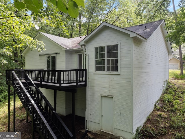 118 Greentree Pkwy, Macon, GA 31220 - rear view of house with a wooden deck, stairway, and a shingled roof