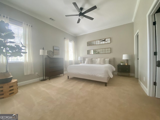 3812 Hartley Bridge Rd, Macon, GA 31216 - bedroom featuring crown molding, light carpet, baseboards, and ceiling fan