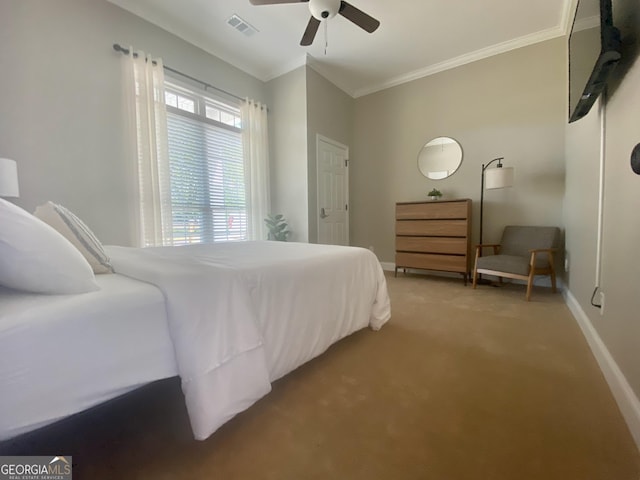 3812 Hartley Bridge Rd, Macon, GA 31216 - bedroom with ornamental molding, carpet floors, baseboards, and a ceiling fan