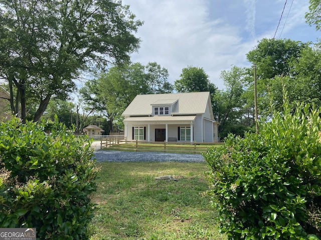 3812 Hartley Bridge Rd, Macon, GA 31216 - view of front of house featuring covered porch and metal roof
