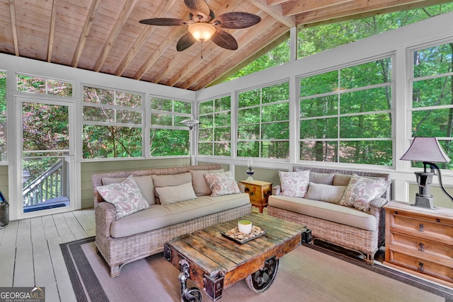 sunroom featuring outdoor lounge area and ceiling fan